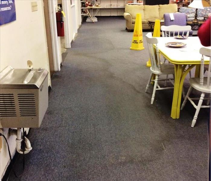 Water staining on commercial carpets.