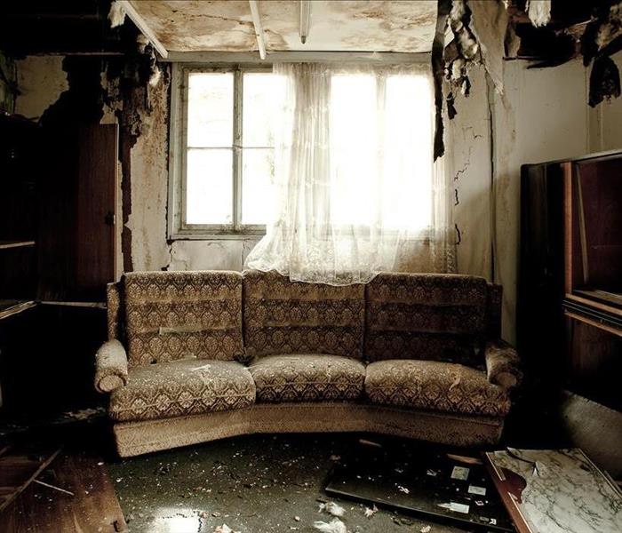 Image of a room damaged with contaminated water. 